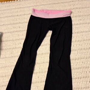 Black and Pink Lululemon Groove flare leg yoga pants